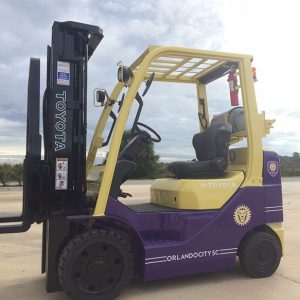 purple and yellow forklift